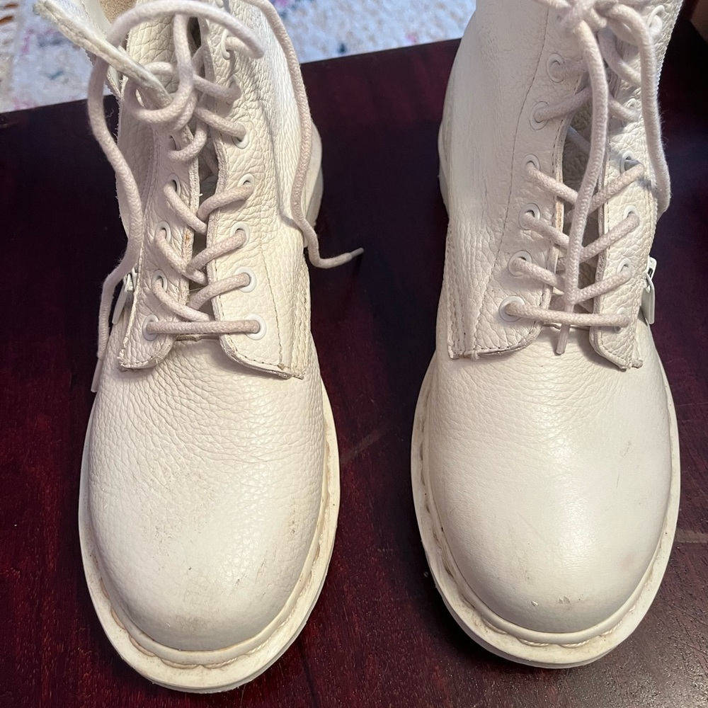 Doc Martens white with white soles.  Worn a few times some minor scuffs.